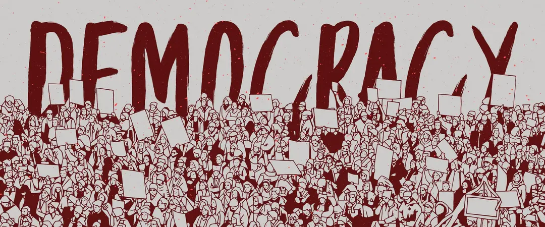 The word “Democracy” in red capitals above a drawn crowd holding up placards